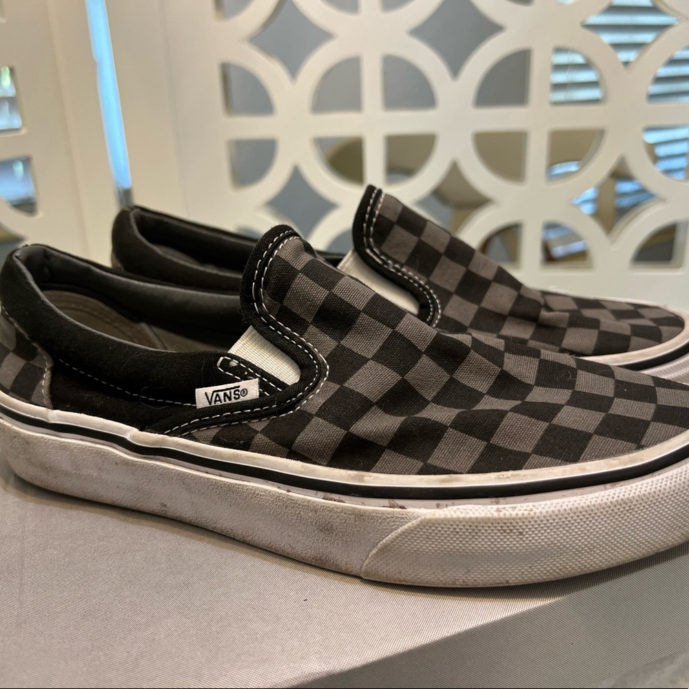 Black/grey checkered slip on Vans size 7.